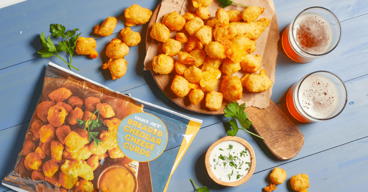 Trader Joe's plate of breaded cheddar curds and box next to it