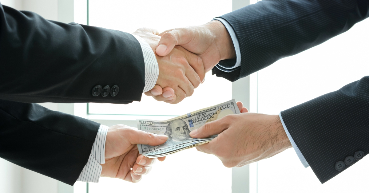 Businessmen making handshake