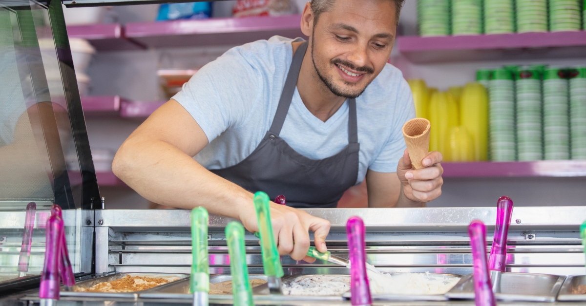 confectioner selling ice cream in the store
