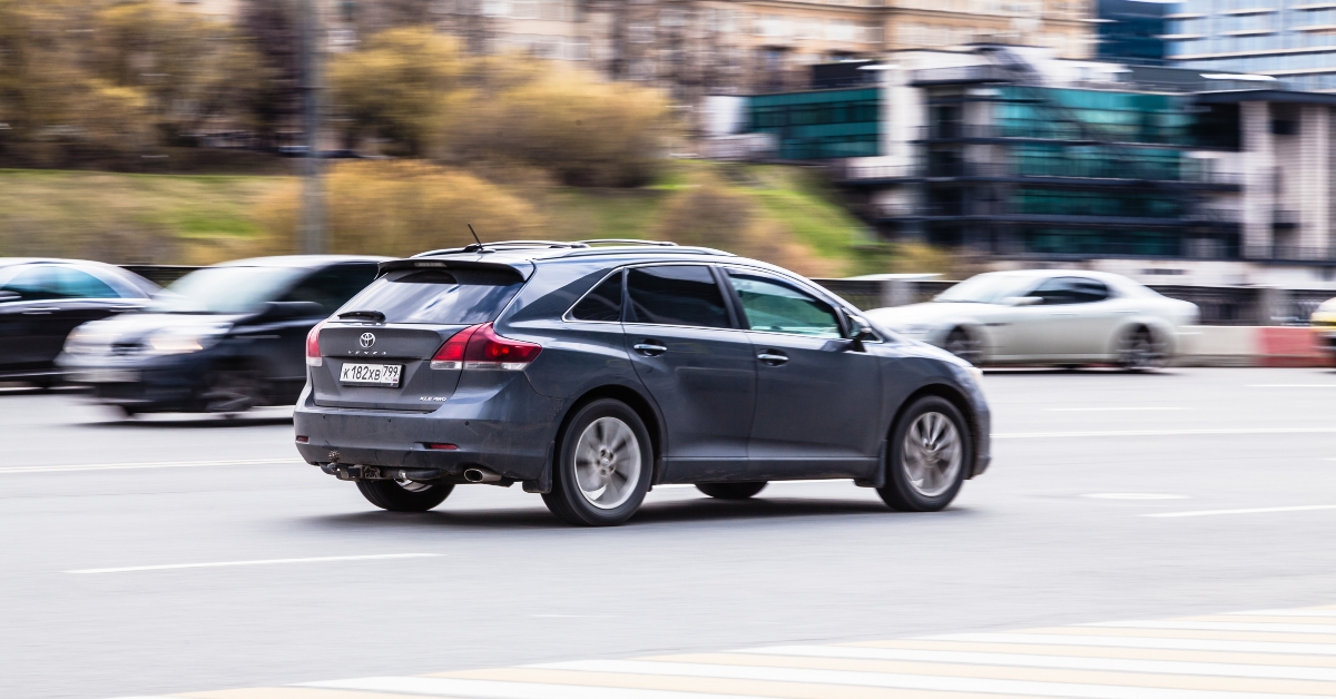 fast moving gray toyota venza