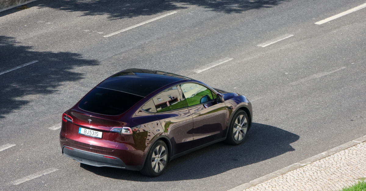 tesla model on asphalt road