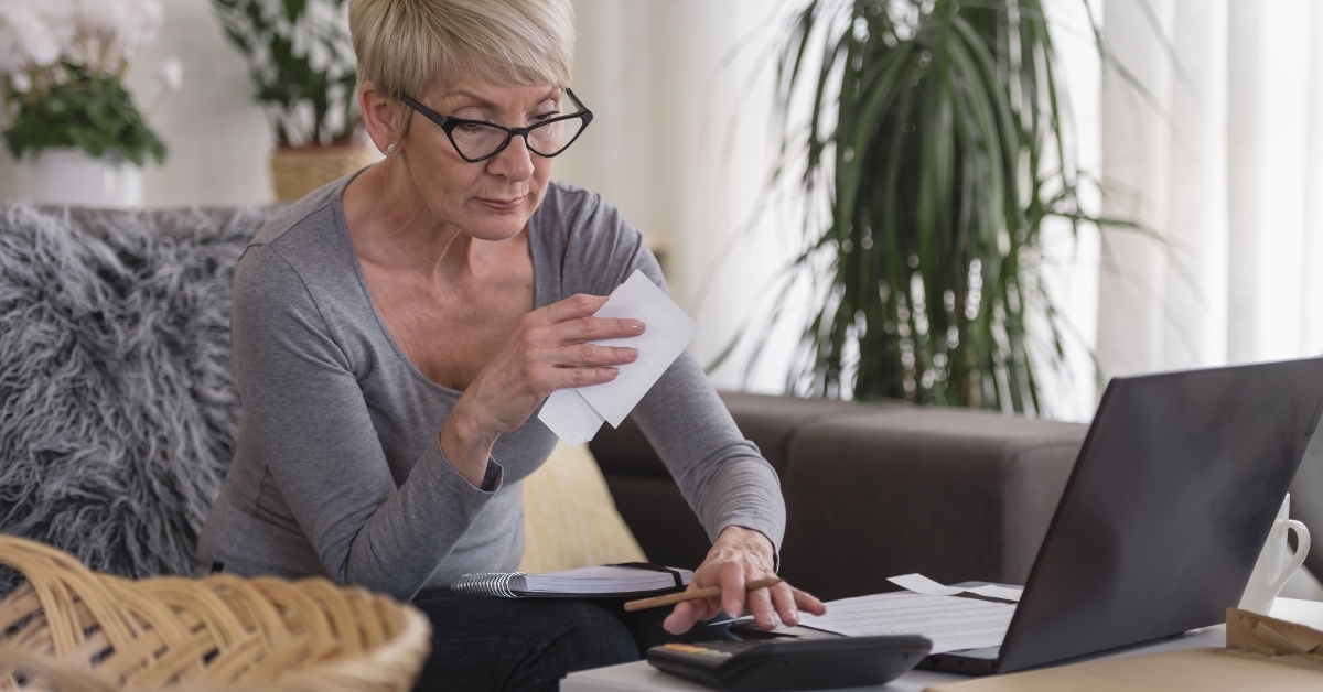 retired woman working on a computer