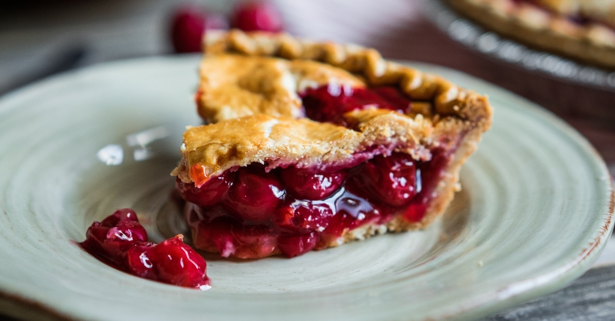 homemade cherry pie on rustic background