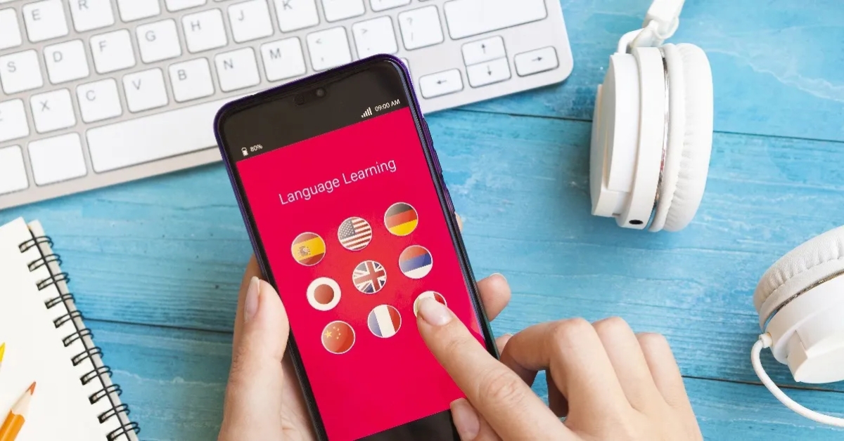 person pressing an app on screen