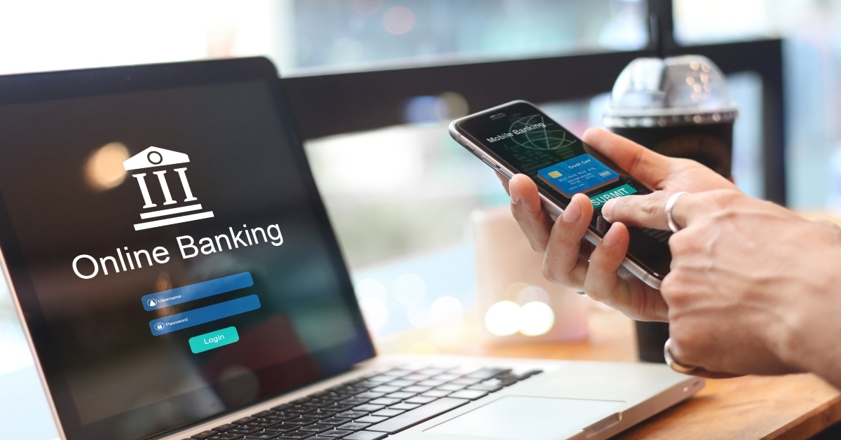 man using online banking with credit card on touch screen device