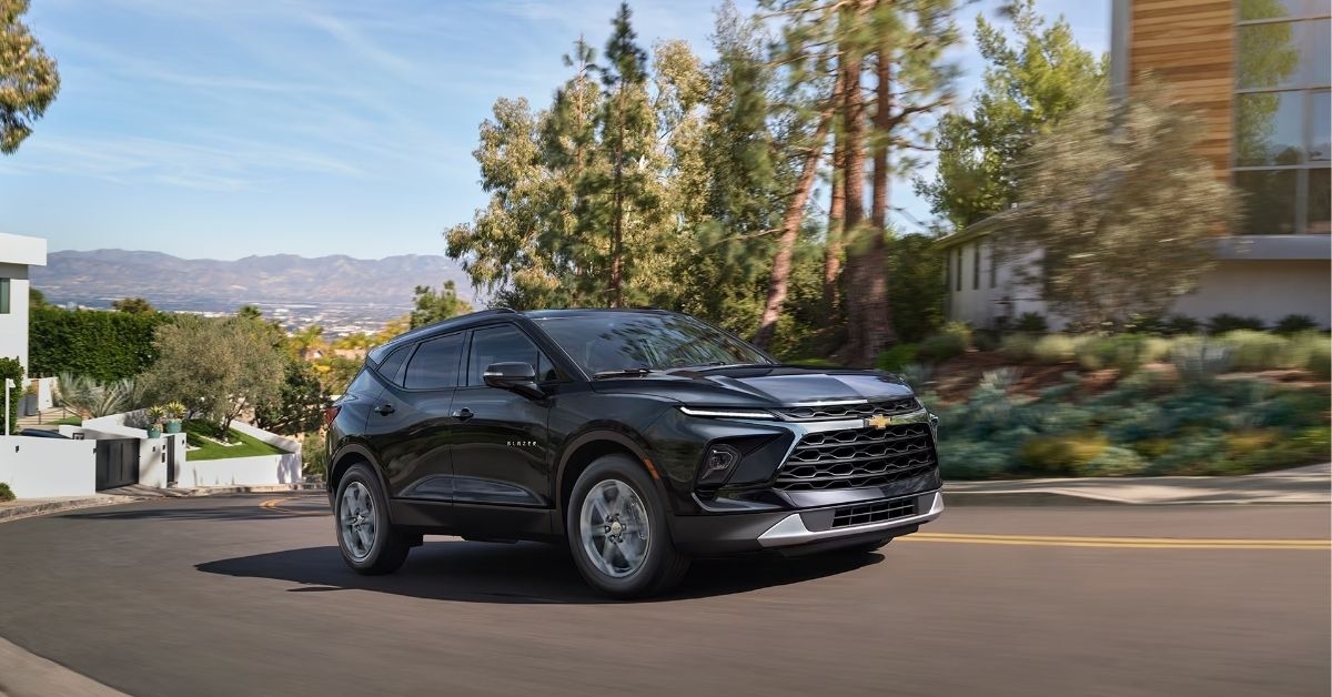 a black chevrolet blazer on road