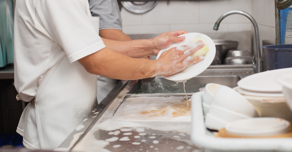Man washing dish