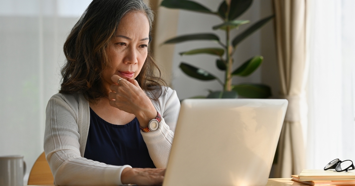 woman working at home using laptop