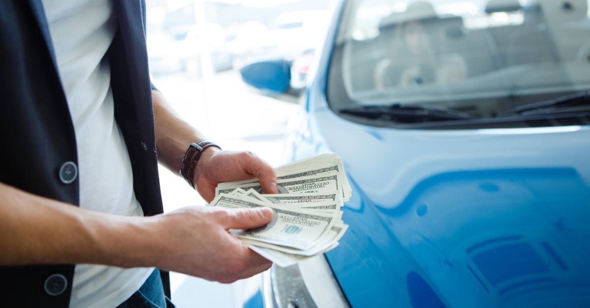 car buyer counting cash