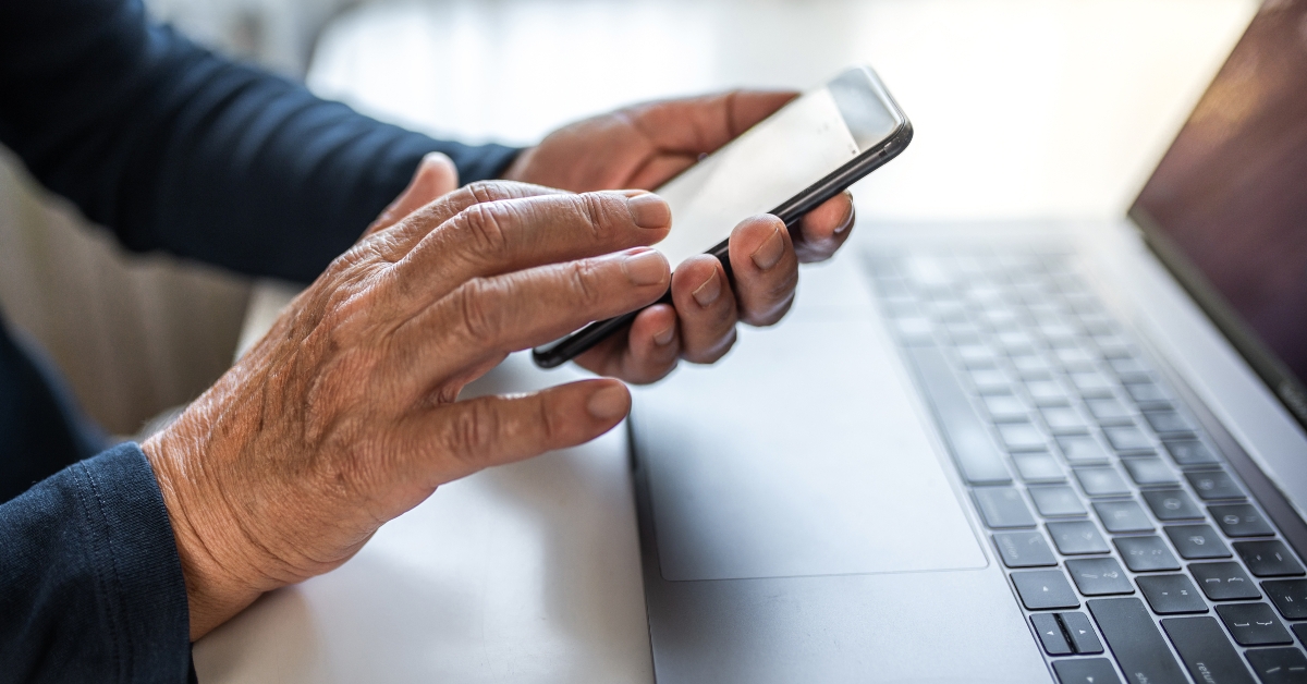 senior person using mobile phone