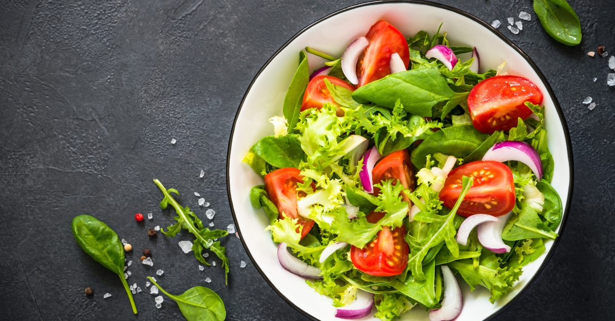 green salad from leaves and tomatoes