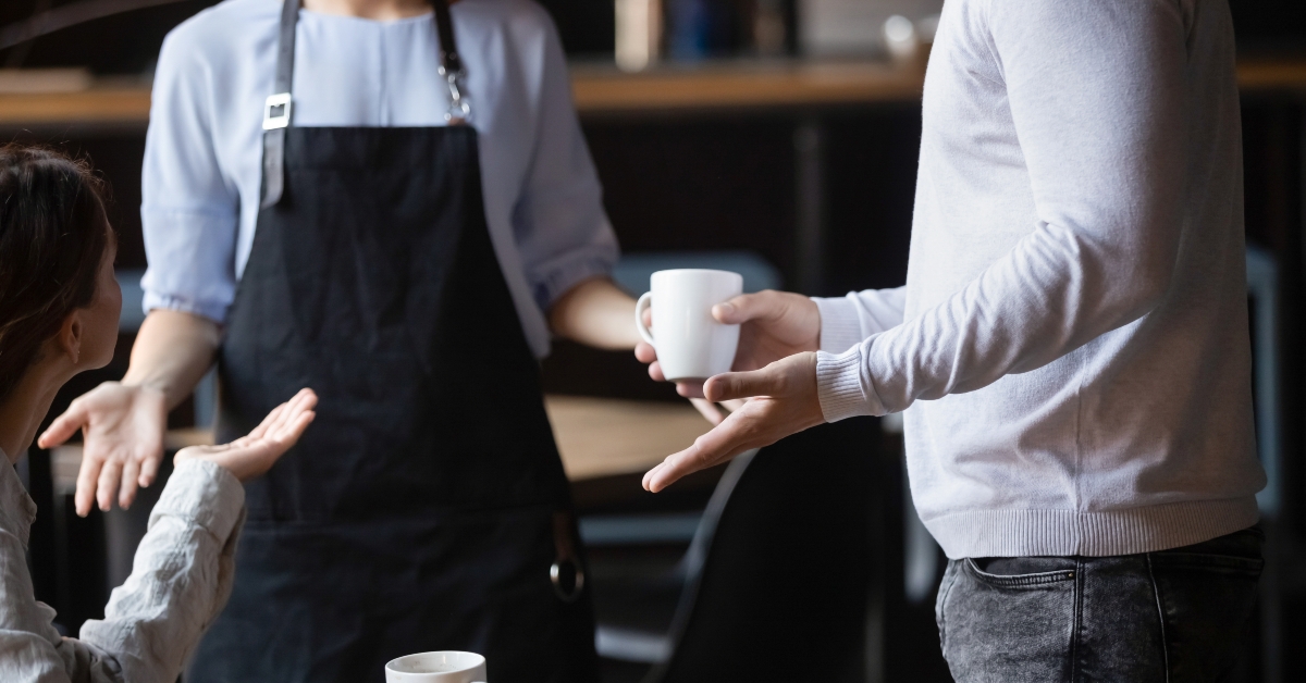 outraged customers arguing with waitress