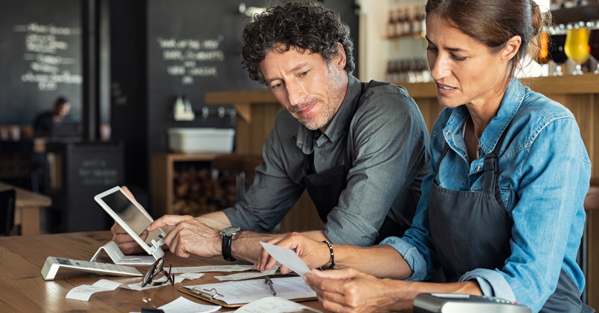 staff calculating restaurant bill