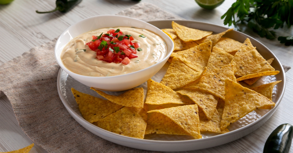 Homemade cheesy dip and chips