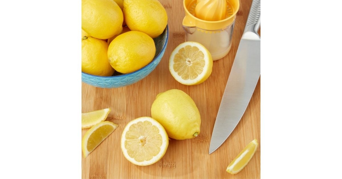 Lemons in a bowl and a knife