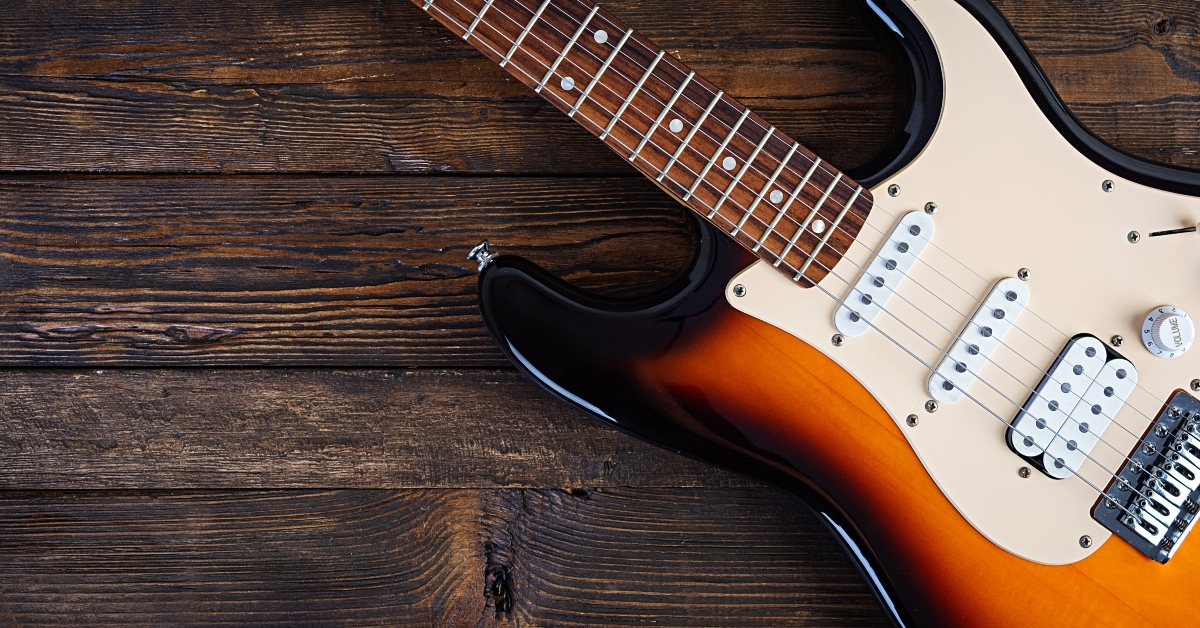tricolored wooden electric guitar