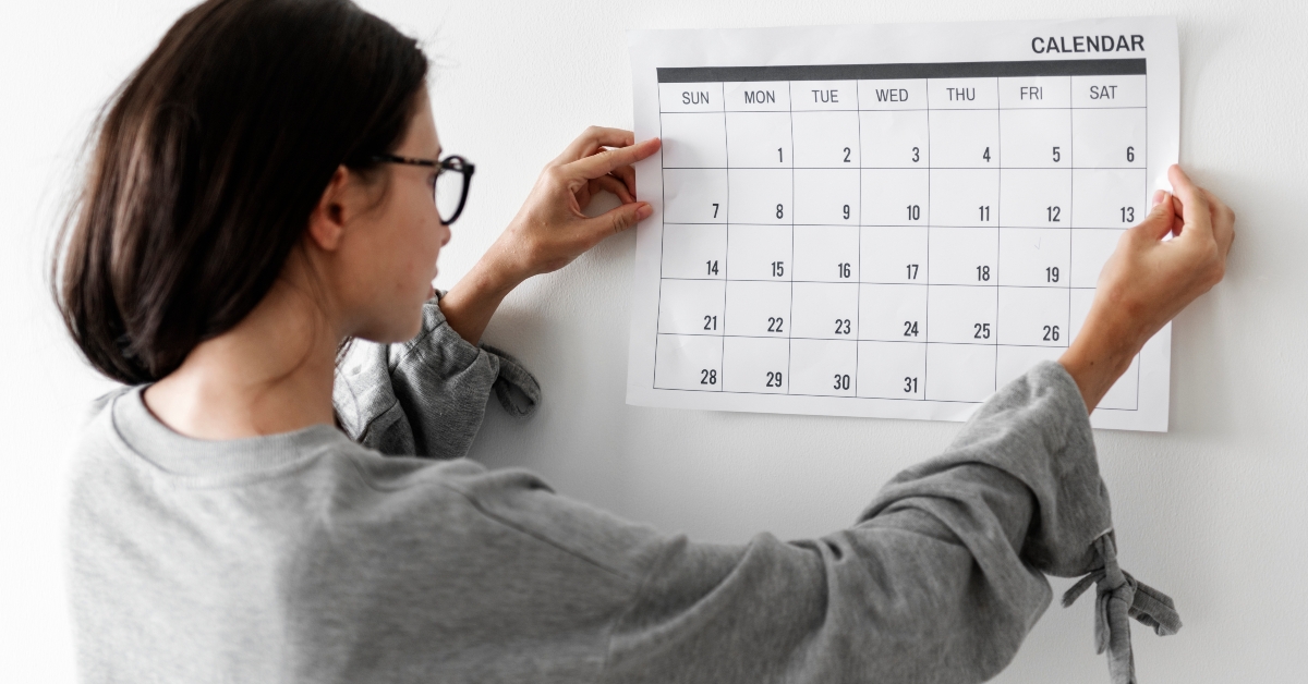 woman checking the calendar 