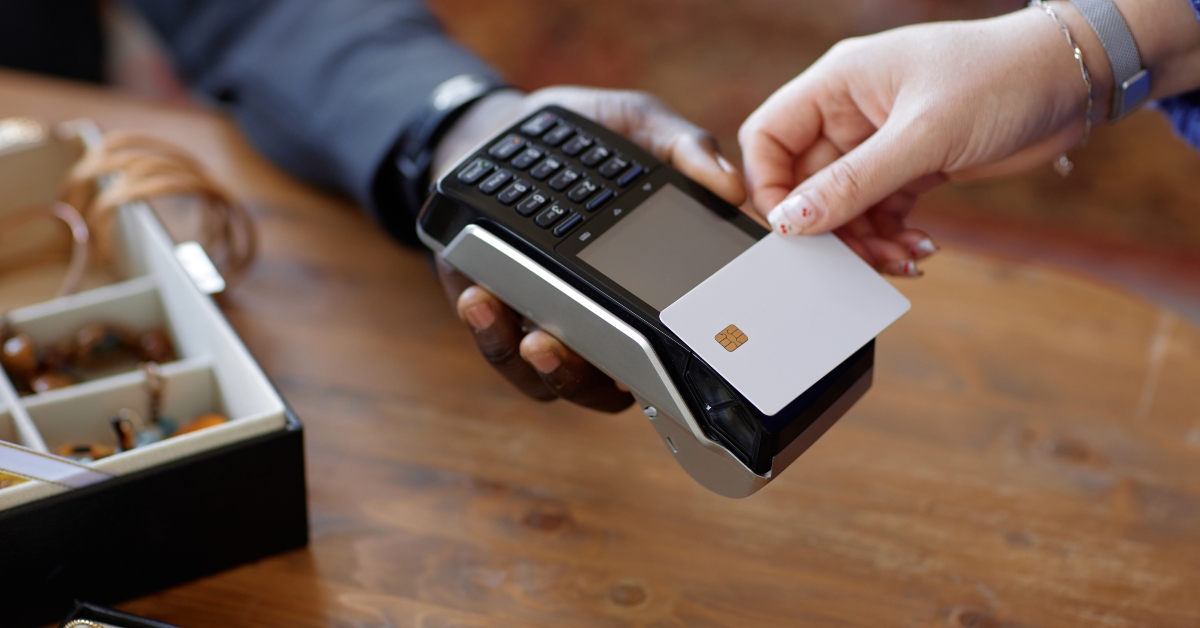 customer paying cashless with white mockup credit card