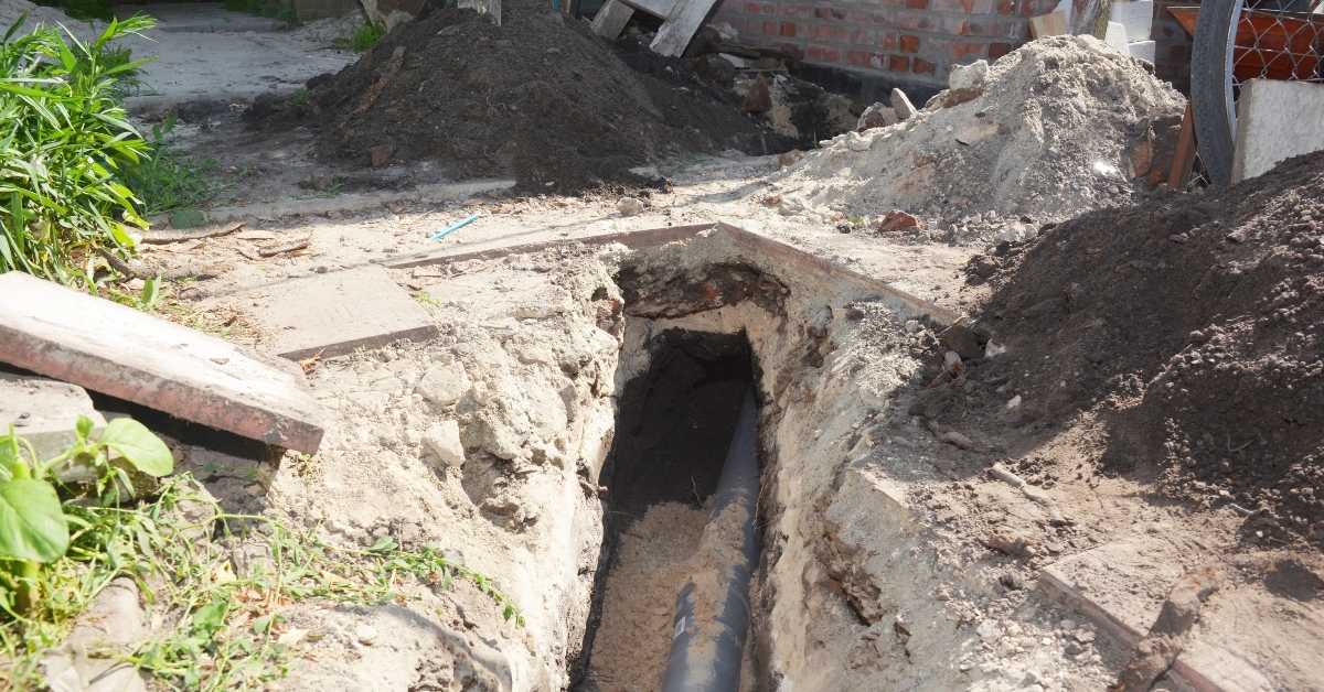 digging trench for drain pipe