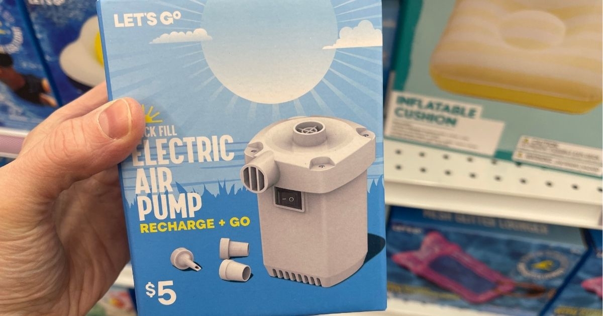 person holding electric air pump