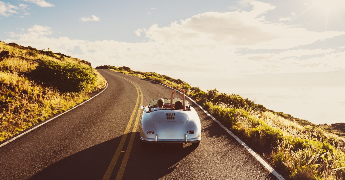 Coupe Driving on Country Road