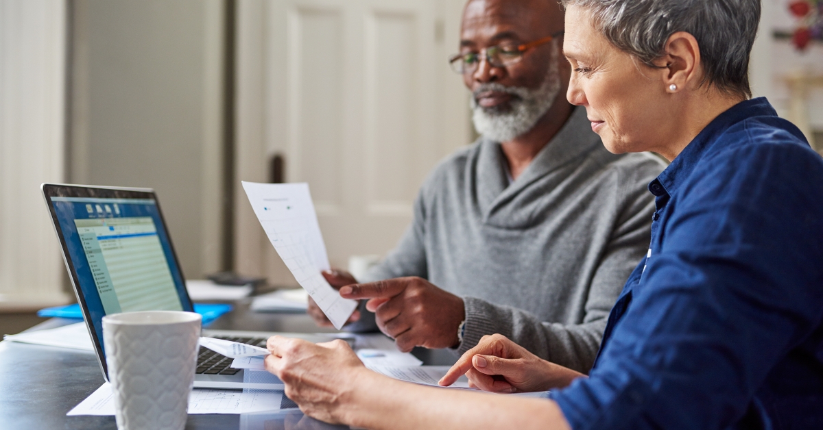 senior couple busy on a budget review