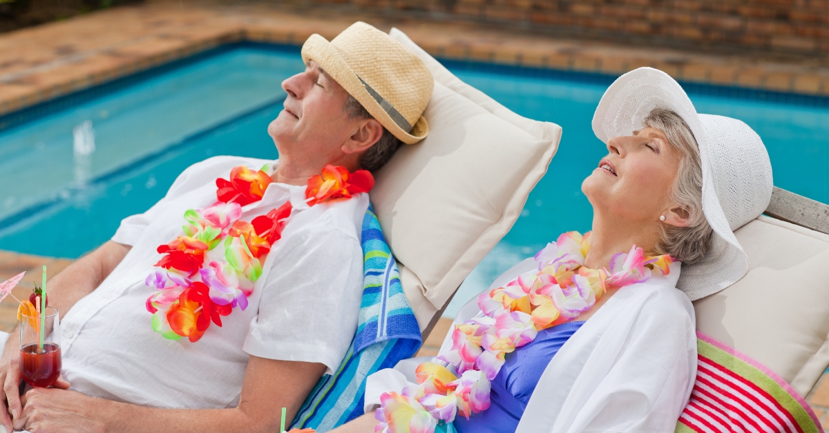 couple sleeping beside the swimming pool 