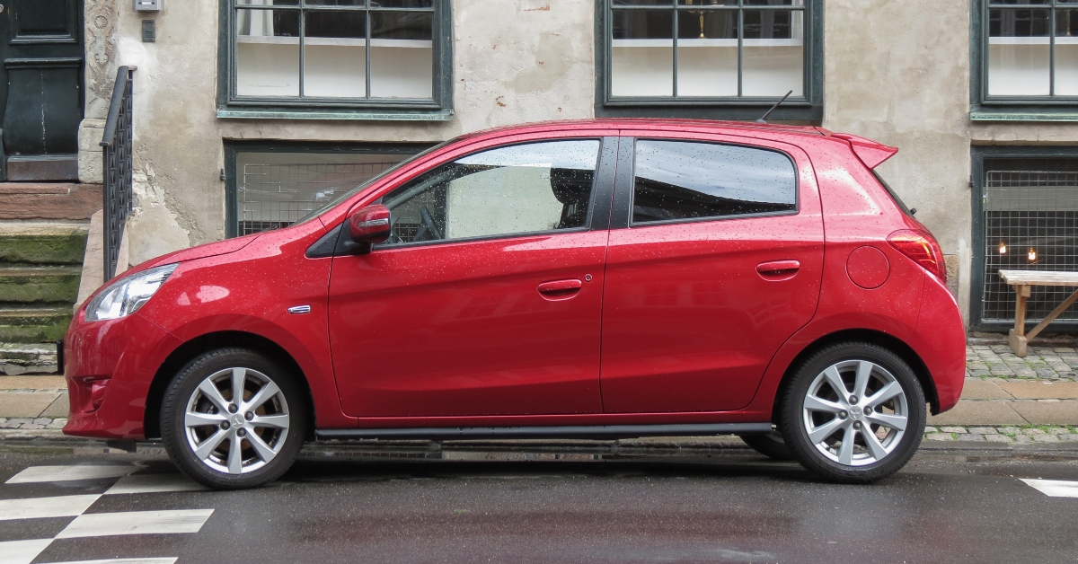 red mitsubishi mirage car