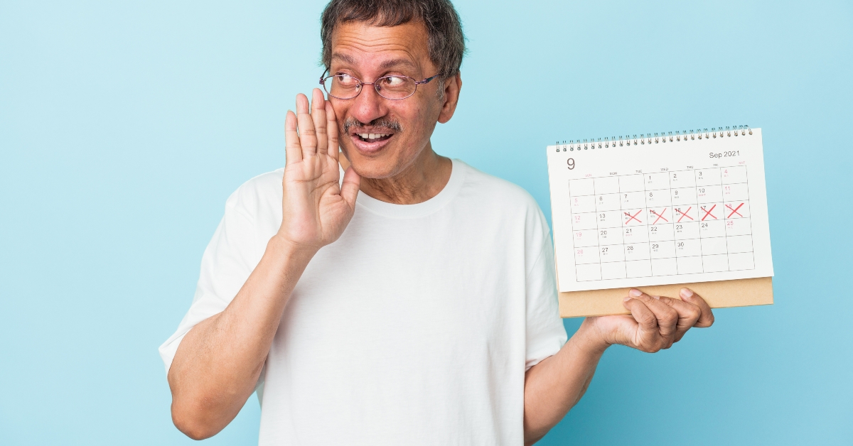 senior man holding a calendar