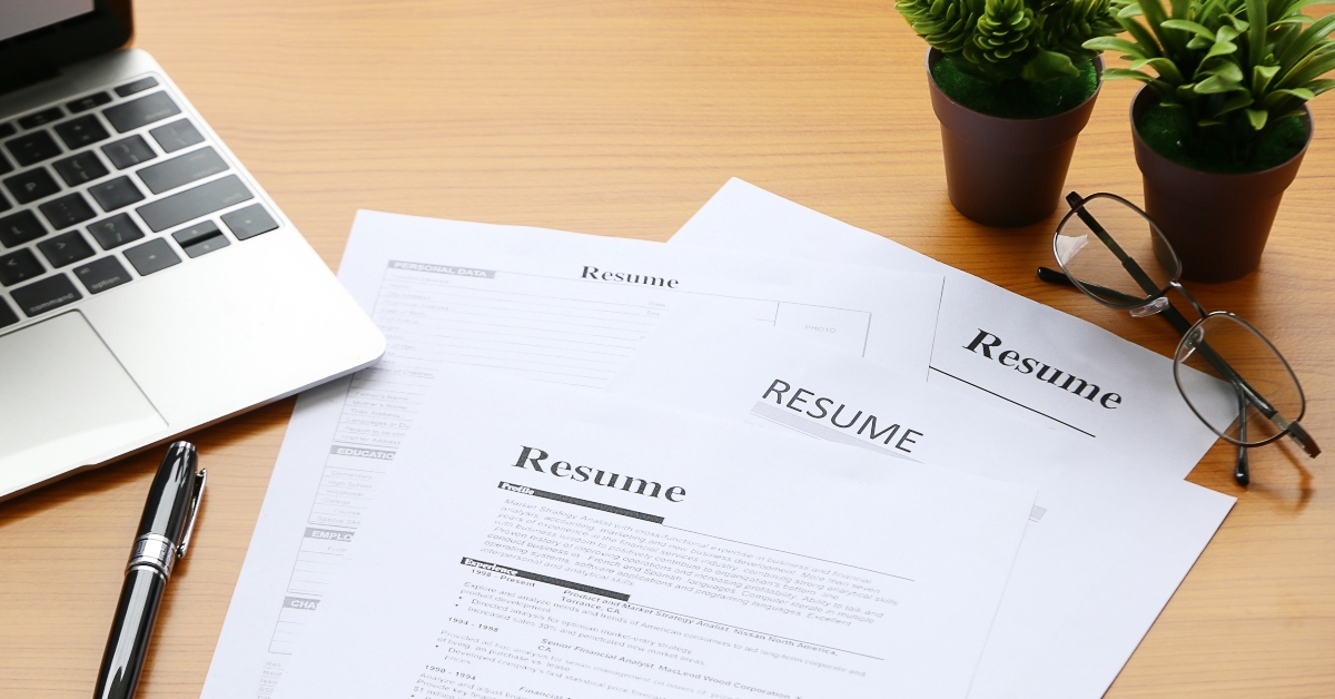 resume on table office business 