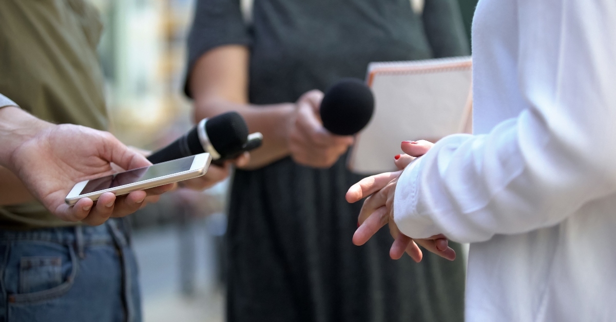 woman gesticulating during interview