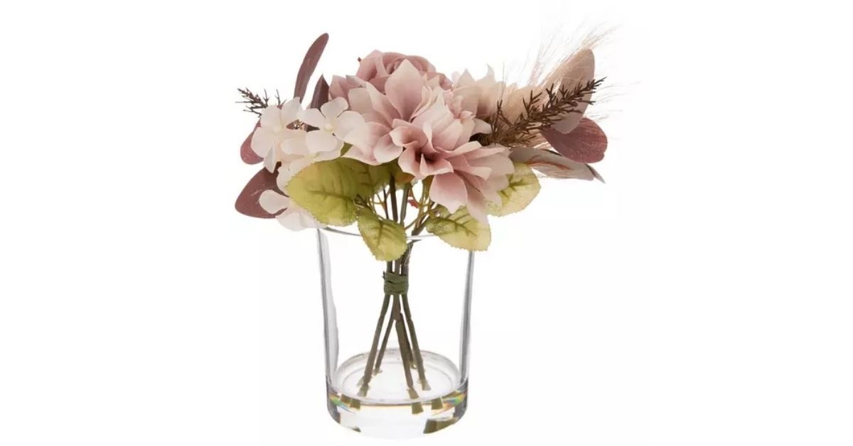 beige florals in glass vase