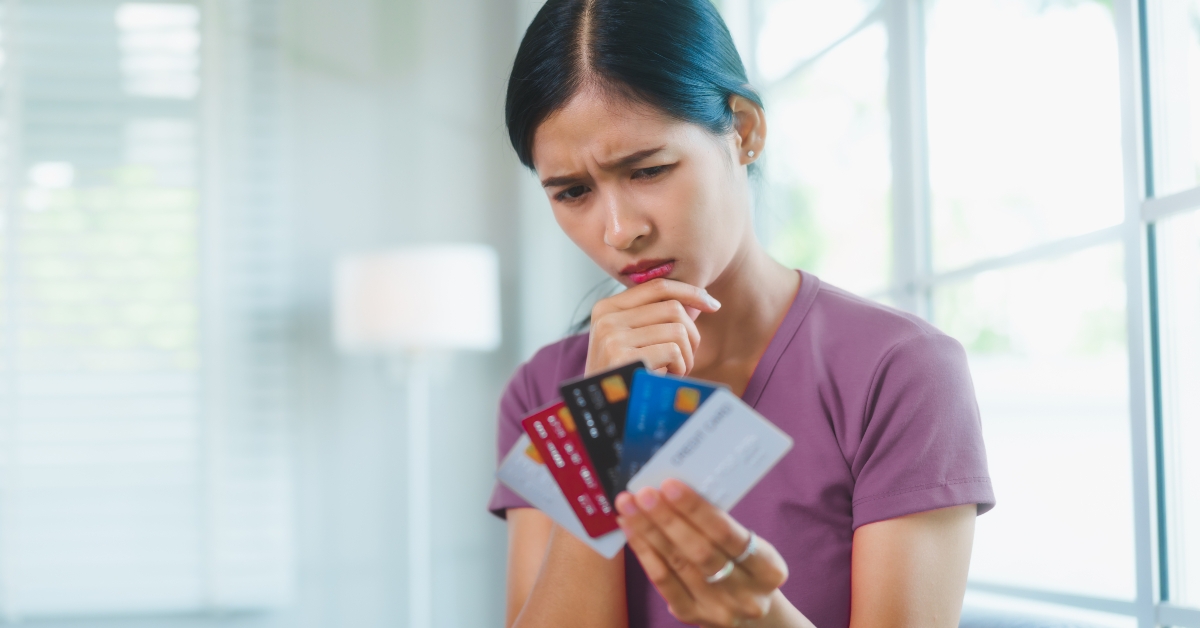 woman feeling anxious by debt and financial bills