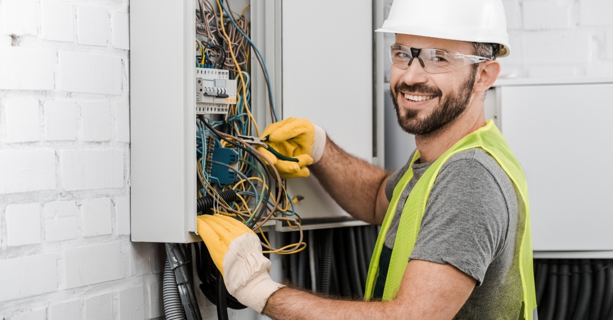 electrician repairing electrical box