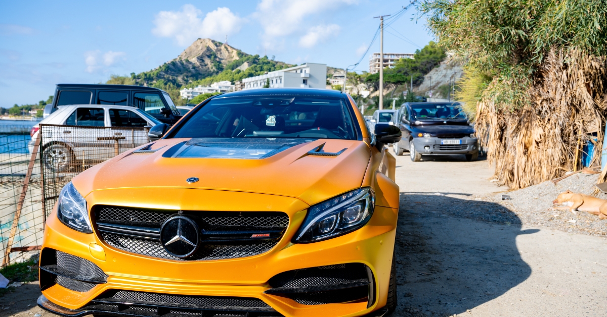 gold mercedes benz c class 63 amg s
