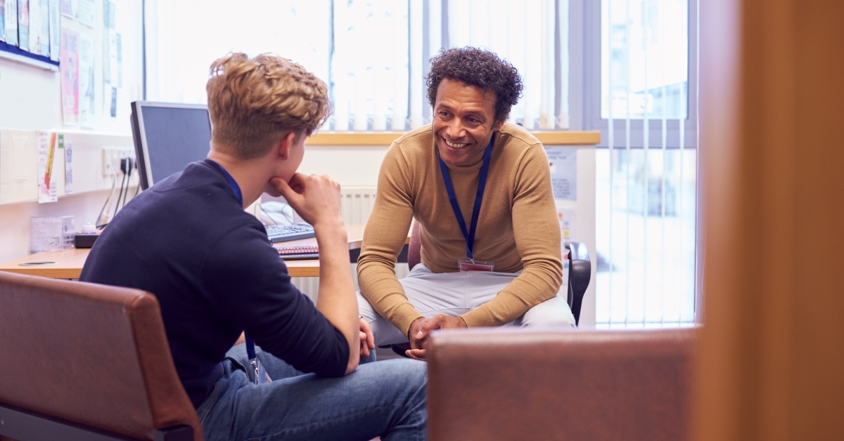 student meeting with campus counselor