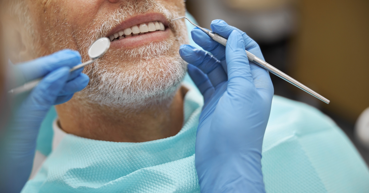 man smiling during dental examination