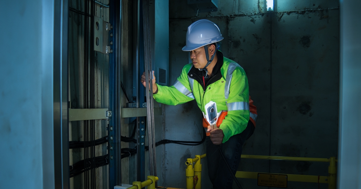 service engineer checking inspector part