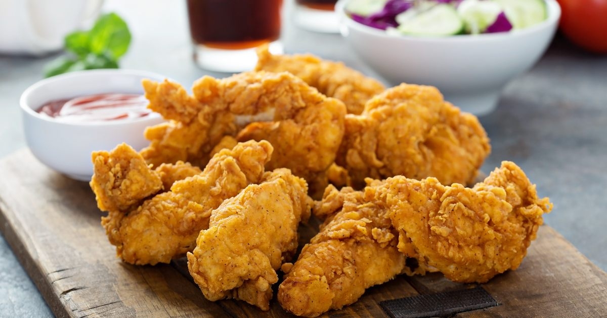 breaded chicken tenders with ketchup