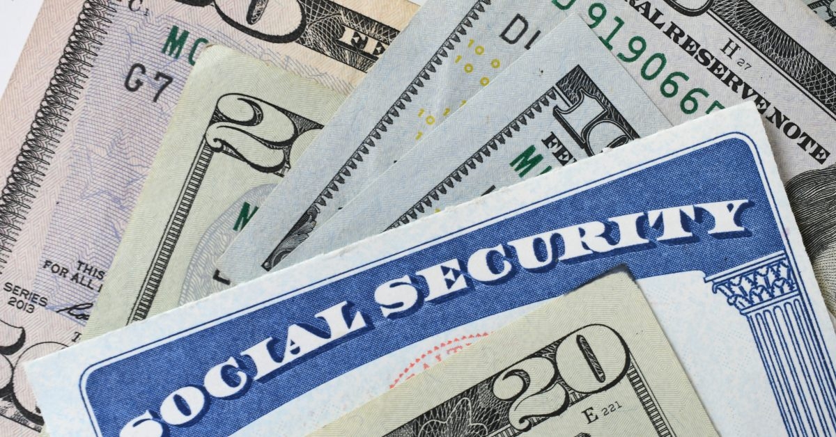social security card with cash money