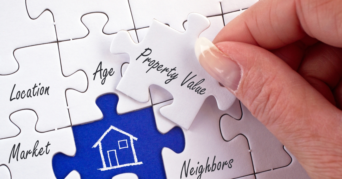 female hand with real estate concept puzzle