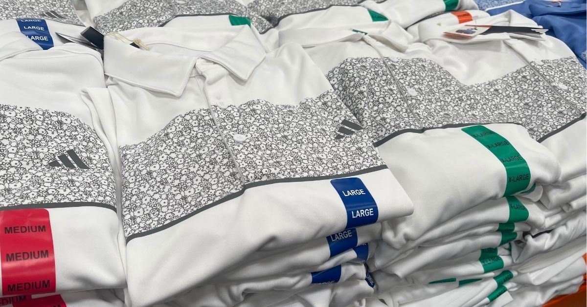 a pile of men's golf polo