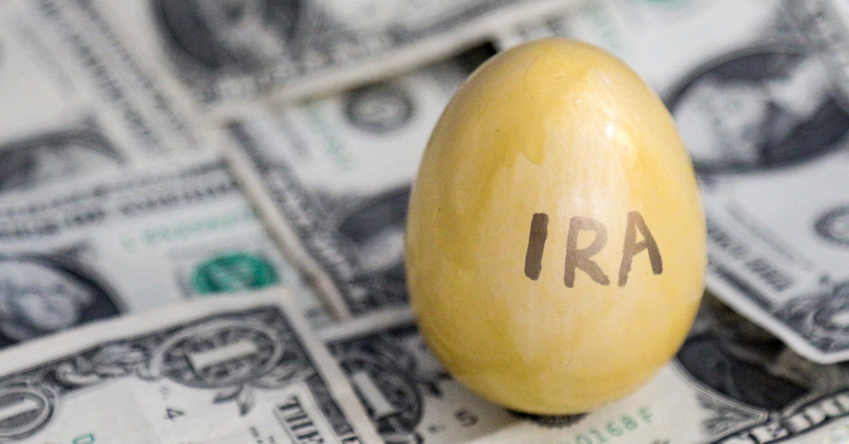 ira retirement saving golden egg on cash