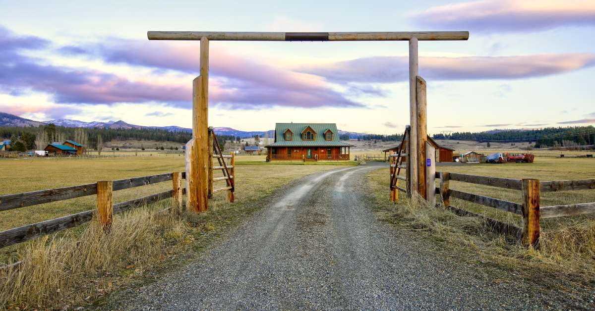 entry gate to a nice wooden ranch home