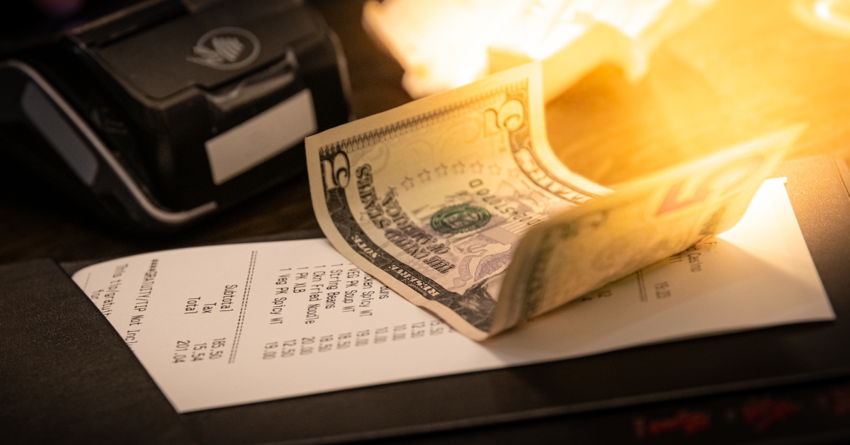 restaurant bill with tip
