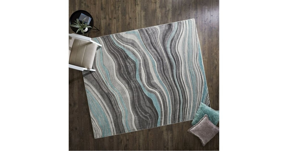 teal carved waves indoor area rug