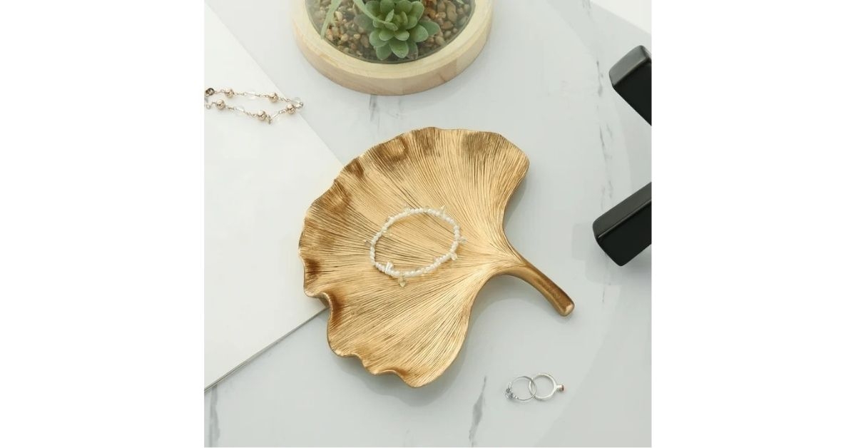 leaf shaped gold indoor tabletop trinket tray