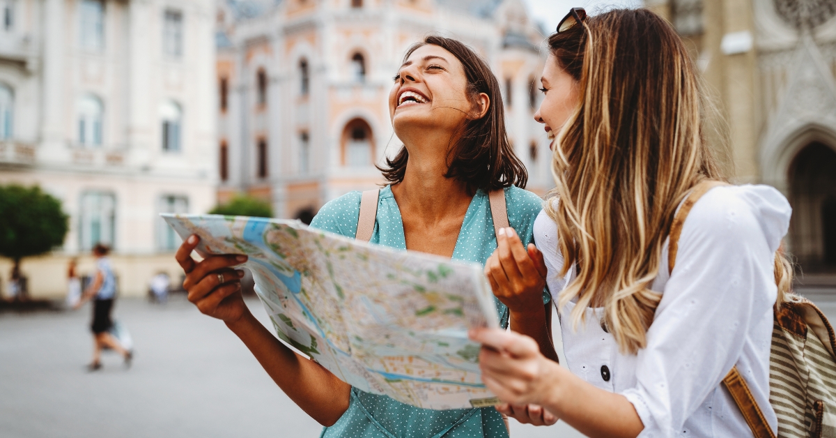 beautiful girls looking for direction in the city