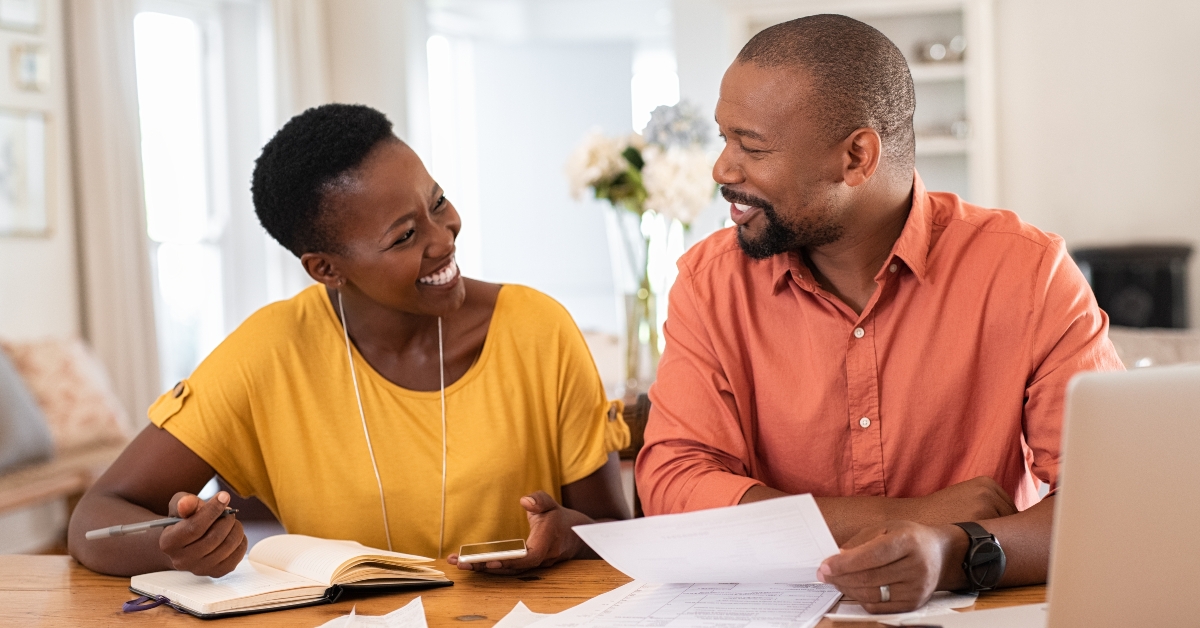 Mature couple managing home finance