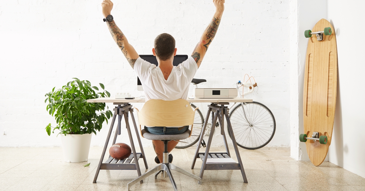 freelancer stretching his hand in air